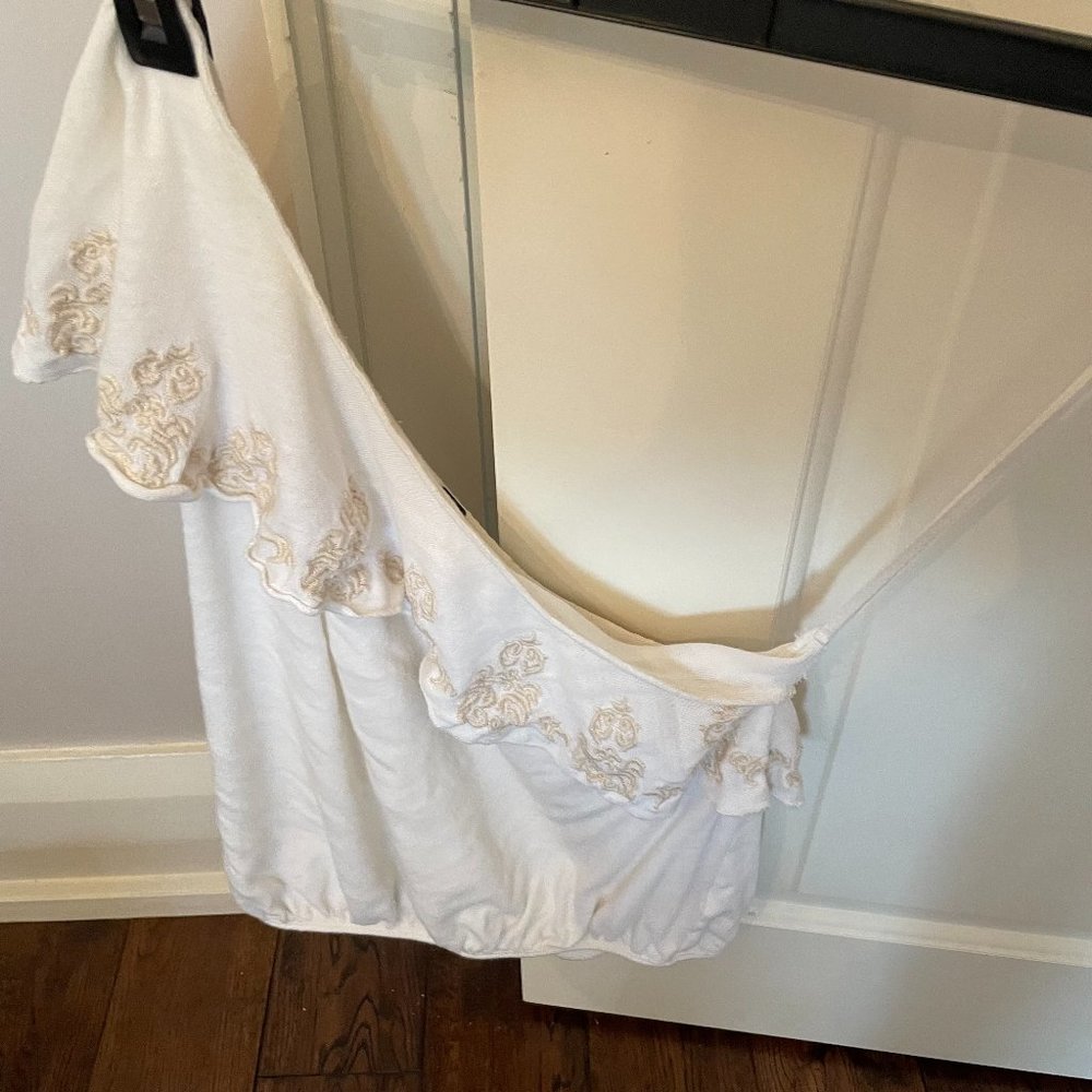 White off the shoulder free people top with flower detail